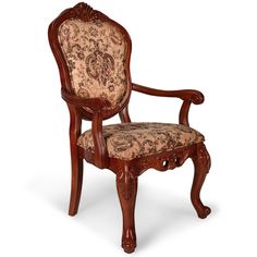 a wooden chair with an ornate upholstered back and arm rests against a white background