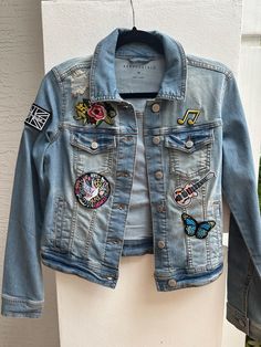 Ladies xs soft denim jacket designed by rockthejacket. One of kind. More pics on instagram. Patches sewn on. Trendy Patched Denim Jacket, Trendy Cotton Denim Jacket With Patches, Trendy Denim Jacket With Patches, Trendy Cotton Denim Jacket With Embroidered Patch, Casual Medium Wash Denim Jacket With Embroidered Patch, Trendy Denim Jacket With Embroidered Patch, Casual Fitted Denim Jacket With Embroidered Patch, Fitted Casual Denim Jacket With Embroidered Patch, Trendy Fitted Outerwear With Patches