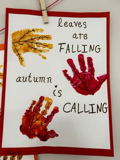 handprints are hanging on the wall with words written below them that read leaves are falling autumn is calling