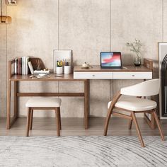 a desk with a laptop on it next to a chair