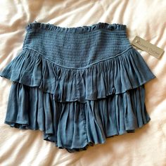 ~Never Worn/Nwt ~Size Large ~Blue Color ~Bought At Lizard Thicket Boutique ~Built In Shorts ~Feel Free To Make Offers!! Short Ruffled Mini Skirt For Day Out, Blue Skirted Bottoms With Ruffles, Blue Mini Skirt With Ruffles, Skirted Blue Bottoms With Ruffles, Blue Ruffled Mini Skirt, Blue Ruffled Skort, Blue Ruffled Tiered Skirt, Blue High Waist Ruffled Skort, Blue High-waist Ruffles Skort