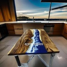 a wooden table sitting in the middle of a kitchen