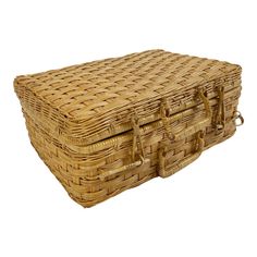 a wicker box with handles is shown on a white background