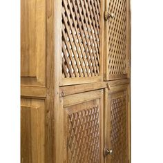 a wooden cabinet with lattice design on the doors