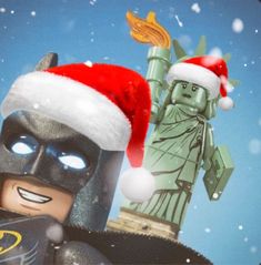 the lego batman movie character wearing a santa hat