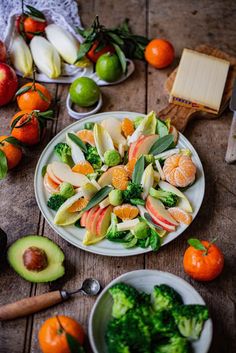 an assortment of fruits and vegetables on a table