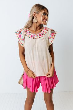 Live life colorfully in our vibrant light natural hued 'Off Into The Sunset' shift top featuring lightweight material with adorable floral embroidery, a rounded neckline, flirty cap sleeves, and a relaxed silhouette that falls into a straight hemline! 
    Measurements XS variant has  a Bust of 36",  a Hip of 40",  a Length of 22",  a Sleeve Length of 4",  a Waist of 38".  S variant has  a Bust of 38",  a Hip of 42",  a Length of 22.5",  a Sleeve Length of 4",  a Waist of 40".  M variant has  a Rounded Neckline, The Sunset, Embroidered Top, Floral Embroidery, Live Life, Cap Sleeves, Sleeve Length, Luxury Fashion, Outfit Accessories