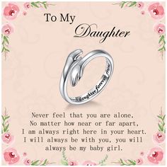 a wedding ring with the words to my daughter on it