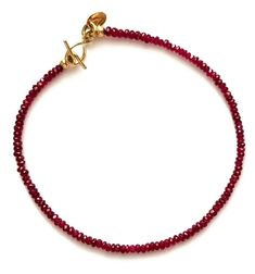 "Ruby, in a rich raspberry red color, the stone of devotion, love, and romance, was chosen for this bracelet. The tiny tag with \"V\" stands for Venexia. If you prefer your custom letter instead, please send a message at checkout. Muladhara red chakras Birthstone - July, Cancer Clasp Material - 14k yellow gold Gemstone - Natural Ruby, 3 - 4mm Ruby earrings to pair, listed individually: https://www.etsy.com/listing/764449244/14k-gold-ruby-studs?ga_search_query=ruby&ref=shop_items_search_5 Siz Gold Birthstone Bracelet, Red Ruby Bracelet, Power Bracelet, Ruby Birthstone, Ruby Bracelet, Ruby Beads, Friend Bracelets, Birthstone Bracelet, Red Bracelets