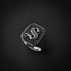 A handmade sterling silver 925 octagon shape old english letter signet ring with black stones. Each ring is cleaned and polished with care. The weight of the ring may vary according to size. Aprrox weight: 8.15gr Measurements: Width - 14.5mm | Height - 16.5mm The ring is made of sterling silver 925 and is water resistant. The ring is set with black zircons. This ring is available in more shapes! Oval> https://www.etsy.com/il-en/listing/579579043/oval-letter-signet-ring-initial-ring Rectangle& Luxury Symbolic Signet Ring With Oxidized Finish, Luxury Oxidized Symbolic Signet Ring, Luxury Silver Signet Ring With Black Enamel, Luxury Oxidized Finish Symbolic Signet Ring, Luxury Black Signet Ring Collectible, Luxury Black Engraved Signet Ring, Luxury Silver Heirloom Initial Ring, Luxury Heirloom Silver Initial Ring, Luxury Black Art Deco Signet Ring