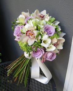 a bouquet of flowers sitting on top of a table