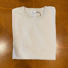 Zara T-Shirt In Pristine Condition New With Tags; Size L Men’s Color Is Off-White With Very Light Green Touches Fits Great/A Bit Oversized Zara Crew Neck T-shirt With Relaxed Fit, Basic Beige Crew Neck T-shirt, Basic Beige Crew Neck Top, Zara Casual Crew Neck T-shirt, Zara Long Sleeve Cotton T-shirt, Basic White Zara T-shirt, Zara Beige Cotton Tops, Zara Crew Neck T-shirt Relaxed Fit, Zara Basic Crew Neck Top