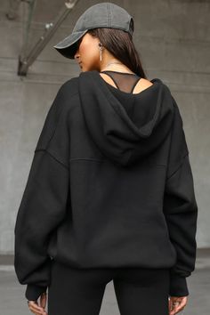 Oversized unisex hooded sweatshirt with back and arm panels. Features front pockets, thumbholes and ribbed banding at the hem and cuffs. Custom knit french terry fabric Brushed mid-weight cotton - ideal for layering Soft, comfortable and made to last Color: Black French Terry Sizing: S/M (0-4), M/L (6-10) Model is 5'8" and wearing a size S/M If you previously purchased the One Size option, we recommend choosing the S/M. For a looser fit, consider sizing up to M/L Fabric: 100% Cotton Care: Machin Fall Gym Hooded Sweatshirt, Hooded Hoodie With Ribbed Cuffs, Athleisure Style, Oversized Athleisure Hoodie With Ribbed Cuffs, Urban Style Long Sleeve French Terry Hoodie, French Terry Outerwear With Ribbed Cuffs For Streetwear, Oversized Black French Terry Hoodie, Solid French Terry Hoodie For Streetwear, Oversized Long Sleeve Hoodie For Gym, Oversized Athleisure Sweater With Drawstring Hood