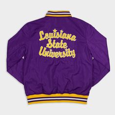 This beloved Louisiana State script, made famous by the 1981 LSU men’s basketball team, looks great with this vintage tiger logo on our retro-inspired bomber jacket. Brought to you in partnership with College Vault. Collegiate Style Track Jacket For Game Day, Collegiate Track Jacket For Game Day, Collegiate Style Track Jacket For Sports Season, Throwback Track Jacket For College Sports Season, Varsity Track Jacket With Embroidered Logo For College, Retro Track Jacket With Baseball Collar For College, Throwback College Track Jacket For Fall, College Throwback Track Jacket For Fall, Throwback Fall Track Jacket For College