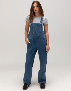 Dickies Heritage Bib Overalls. Dickies Women's Relaxed Fit Bib Overalls Will Deliver Freeing Comfort While Giving You The Support And Durability You Need For Your Workday. You Can Rely On Its Reinforced Double Stitching, So You Can Rest Easy Because These Are Definitely Built To Last. Not To Mention Eight Pockets, And Tool Loops, Too, To Keep Everything You Need To Carry Safe And Easy To Access. The Generously Relaxed Fit Of These Overalls Feels Great, Too. What More Can You Ask For? 8 Functional Pockets, Including Chest Pocket With Pencil Division. Hammer Loop & Key Loop. Reinforced Double-Needle Stitching. Washed For Softness. Generous Relaxed Fit; Straight Leg. Inseam: 32". 75% Cotton, 25% Polyester. Machine Wash. Imported. Model Is Wearing A Size Small. Model Measurements:height: 5'8" Dickies Overalls, Baggy Overalls, Womens Overalls, Wwe T Shirts, Flannel Sweatshirt, Dickies Women, Flannel Jacket, Bib Overalls, Girls Blouse