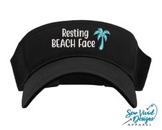 "Save 20% off your first purchase by signing up at https://signup.sewvividdesigns.com This lightweight and comfortable visor features Resting BEACH Face with a palm tree embroidered on your choice of visor. For more font options, send me a message and we will find the perfect font for you! Visor featured in photo: Black Starfish Color in photo: Aqua 🧢 Visor Details 🧢 -One size fits most -Pre-curved visor -100% cotton -Hook and loop adjustable closure (Velcro) -Visor panel height 2.25\" -Visor Cheap Visor Bucket Hat For Beach, Cheap Adjustable Fitted Hat With Curved Visor, Cheap Classic Snapback Hat With Visor, Affordable Classic Snapback Hat With Visor, Cheap Outdoor Dad Hat With Curved Visor, Cheap Black Fitted Hat With Curved Visor, Cheap Snapback Visor Hat For Streetwear, Cheap Black Fitted Hat With Visor, Cheap Beach Snapback Visor Hat