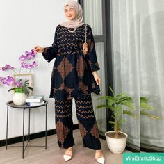 "Material: Rayon Cotton Size Details: - Chest circumference 120 cm - Shirt length 90 cm - Pants length 100 cm - Thigh circumference 74 cm - Waist circumference 75-120 cm Please leave your PHONE NUMBER in the \"note to seller\" at checkout for SHIPPING PURPOSE" Bohemian Printed Tunic Set, Casual Black Sets For Eid, Printed Long Sleeve Tunic For Eid, Long Sleeve Printed Tunic For Eid, Eid Long Sleeve Printed Tunic, Traditional Long Sleeve Patterned Sets, Traditional Long Sleeve Sets With Batik Print, Bohemian Sets With Batik Print For Festive Occasions, Bohemian Black Sets With Printed Motifs