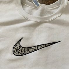 cotton/poly white crewneck with embroidered design! unisex adult sizing. these are made to order! please allow 2-4 weeks for shipment ᵕ̈ model is 5'5, usually a size small & wearing a size large. Nike Crewneck Sweatshirt Embroidered, Custom Nike Crewneck, Crewneck Design Ideas, Stockholm Girl, God Energy, 80s Fashion Men, Nike Crewneck Sweatshirt, Hawaii House, Embroidery Crewneck