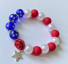 Blue Stretch Bracelet For 4th Of July Gift, Blue Adjustable Stretch Bracelet For 4th Of July, Patriotic Multicolor Stretch Bracelet For 4th Of July, Independence Day White Bracelets Gift, White Bracelets For Independence Day Gift, 4th Of July Gift Round Beads Stretch Bracelet, White Bracelets For 4th Of July Gift, Patriotic Blue Friendship Bracelets, Patriotic Blue Friendship Bracelet