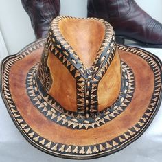 This Hat Is Amazingly Beautiful With Great Craftsmanship Displayed All Around. Handmade In Mexico. Beautifully Decorated Leather Handcrafted Stitching Vintage Antiqued Oiled Leather Pictures Do Not Do It Any Justice. Worn Twice Only Unisex Size 10 Brim 3.5" Crown 4" Excellent Pre-Owned Condition Unique And Truly A Beaut Of A Hat. $ 189 Firm Keywords Cowboy Cowgirl Western Rodeo Boho Hippie Chic Nashville Style Handbag Boots Musician 70's Retro Bohemian Woodstock Flower Leather Saddle Country Fab Nashville Style, Retro Bohemian, Boho Hat, Boho Hippie Chic, Western Rodeo, Cowgirl Western, Cowboy Cowgirl, Western Boho, 70s Retro