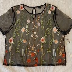 Size 1xl See-Through Flower Detailed Shirt Spring Crew Neck Blouse With Floral Print, Spring Floral Print Crew Neck Blouse, Spring Black Shirt With Floral Embroidery, Black Shirt With Floral Embroidery For Spring, Black Floral Print Crew Neck Tops, Spring Black T-shirt With Floral Print, Black Short Sleeve Top With Floral Embroidery, Black Short Sleeve Tops With Floral Embroidery, Black Floral Print T-shirt For Spring