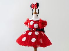 ✨ Introducing the Enchanting Red Tutu Dress for Toddlers & Babies! ✨ Calling all loving mothers who want the best for their precious ones! Step into a world of magic with our stunning tutu dress. Perfect for birthdays, Halloween, festivals, trips, and everyday dress-up, this dress promises unforgettable moments and turns heads wherever your child goes. Our Dress combines cotton and sequin fabric for a stunning appearance that's both playful and comfortable. With an elastic waist and adjustable straps, it ensures a snug and flexible fit for your little one as she grows. 🎀 Handmade Magic: Every detail is carefully crafted with love. From the delicate ears (optional, available at extra cost) to the charming bows and playful polka dots, our dress sparks imagination and brings the joy of to li Red Princess Costume Dress, Red Princess Tutu Dress For Costume Party, Red Fitted Princess Dress For Birthday, Fitted Red Princess Dress For Birthday, Red Halloween Dress For Dress-up, Red Dress For Halloween Dress-up, Fitted Princess Dress For Christmas Birthday, Playful Dresses For Holiday Parties, Red Dresses For Halloween Fancy Dress