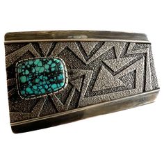 Tufa cast sterling silver with spiderweb turquoise stone created by Navajo jeweler Richard Tsosie. Buckle measures 2.25" high by 3.25" long and will accommodate a 1.5" belt strap. In very good vintage condition retaining its original patina. Hand signed R Tsosie on verso. Suitable for a man or woman. 90.7 grams. Jeweler Richard, Spiderweb Turquoise, Tufa Casting, Native American Turquoise, Spider Web, Turquoise Sterling Silver, Turquoise Stone, Belt Buckle, Belt Buckles