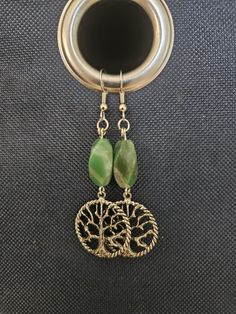 Tree of life earrings on antique brass with green Jade. Inspired by nature and handcrafted in the Columbia river Gorge. Tree Of Life Earrings, Hood River, Columbia River Gorge, Columbia River, Green Jade, Jade Green, Tree Of Life, Antique Brass, Jewelry Earrings Dangle