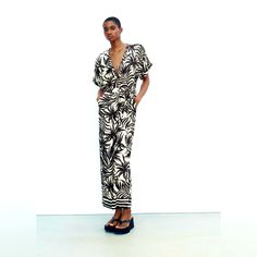 Printed Belted Jumpsuit V-Neck Jumpsuit With Short Cuffed Sleeves. Self Belt. Straight Leg. Front Button Closure. Ecru / Black | 9878/116 Composition Outer Shell 100% Viscose Beige V-neck Jumpsuits And Rompers For Day Out, Chic Cream Jumpsuits And Rompers For Vacation, Chic Zara V-neck Jumpsuits And Rompers, Zara V-neck Jumpsuits And Rompers For Beach, Zara V-neck Beach Jumpsuits And Rompers, Chic Zara Jumpsuits And Rompers For Vacation, Zara V-neck Jumpsuits And Rompers For Day Out, Casual Cream V-neck Jumpsuits And Rompers, Casual Cream V-neck Jumpsuit