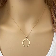 10k Solid Gold Eternity Circle Of Life Pendant Necklace Item No.: Ba94 Metal Type: 10k Solid Yellow Gold (Also Available In 14k Solid Gold) Metal Color: Yellow Gold. (Also Available In White Gold And Rose Gold) Pendant Only Weight: 1.1 Grams With Chain Weight: 2.1 - 2.3 Grams (Vary From Chain) Pendant Height With Bail: 1.1" Pendant Width: 0.77" Ring Diameter : 19.4 Mm. Chain Available In 16", 18", 20", 22" Note: Made In Usa. Please Allow 10-15 Days To Be Shipped 14k Yellow Gold Circular Jewelry, 14k Yellow Gold Circle Necklace, Sterling Silver Open Circle Jewelry In Yellow Gold, 14k Yellow Gold Open Circle Necklace, Gold Jewelry With Clavicle Chain In Open Circle Shape, Fine Jewelry In Gold With Open Circle Design, Gold Clavicle Chain Jewelry In Open Circle Shape, Gold Open Circle Fine Jewelry, Gold Clavicle Chain Jewelry With Open Circle