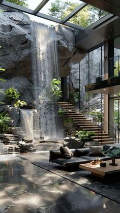 a living room filled with lots of furniture and a waterfall in the middle of it