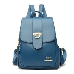 Color: Blue Solid Color Leather Travel Bag, Leather Travel Bag In Solid Color, Solid Color Leather Shoulder Bag For Travel, Leather Shoulder Bag In Solid Color For Travel, Casual Blue Leather Backpack With Zipper, Large Capacity Blue Leather School Backpack, Trendy Blue Leather School Backpack, Blue Leather Satchel Backpack, Trendy Blue Leather Backpack For Daily Use