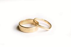 The gold Bark Wedding Band set complements each other in their simple, understated beauty. Hers is a delicate, hand-formed, lightly hammered, while his hand-hammered band measures a substantial 6mm. Elegant and modern, with just a touch of rusticity. Wedding Ring Sets Simple, Nature Details