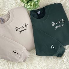 If you're looking for a shirt that's elegant, sophisticated and reflects your faith, check out our Grade Sweatshirt and Embroidered Faith Sweatshirt. The product is specially designed for those who want to express their faith. Grade Sweatshirt, Fair Sweatshirt is designed to stand out with intricate and meticulous cross-stitch embroidery on the sleeves, creating a delicate and meaningful highlight for those who want to express their faith. Every detail is carefully cared for, bringing grace and Christian Clothing Brand, Faith Sweatshirt, Jesus Clothes, Christian Shirts Designs, Friends Sweatshirt, Custom Cross, Hand Design, Matching Sweaters, Christian Sweatshirt