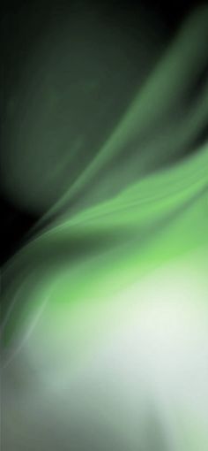 an abstract green and white background with some blurry lines on the bottom right corner