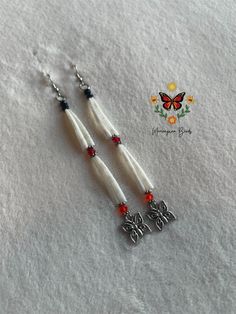 Made with Dentalium shells, various 4mm bicones, butterfly charms and are on fish hooks. Indigenous made on treaty 1 land. Indigenous Butterfly, Fish Hooks, Beaded Jewelry Patterns, Butterfly Charm, Shell Earrings, Jewelry Patterns, Beautiful Earrings, Beaded Earrings, Bead Work