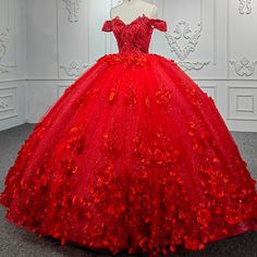 Make a bold and beautiful statement on your quinceanera with the Sweet Valentine Red Quinceanera Dress. The dress features a stunning ball gown silhouette crafted from layers of delicate tulle fabric that provide volume and movement, giving you a dreamy and ethereal look. The striking red color symbolizes love and celebration, making it the perfect choice for your special day. The off-the-shoulder neckline is the epitome of romance, beautifully framing the shoulders and collarbones, while the sl Red Quinceanera Dress, Tulle Balls, Bridal Gowns Mermaid, Red Wedding Dresses, Lace Prom Dress, Quinceanera Dress, Tulle Ball Gown, Fantasy Gowns, Sweet Valentine