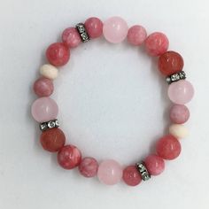 "💘 Rose Quartz, Pink Jade & Cherry Agate Gemstone Bracelet, Valentines Day Gift for Her, Boho Healing Bracelet. Colorful semi precious bracelet. Free Shipping.  Accents are Gunmetal Crystal Spacer beads, they sparkle like CRAZY! So easy to LOVE! Our Bracelets look amazing stacked and layered, wearing more than one is so much FUN! 8mm, 10mm and 12mm Polished Semi Precious Polished Rose Quartz, Pink Jade and Cherry Agate Gemstone Beads. This listing is for one (1) Bracelet and comes packaged in C Agate Stretch Bracelet With Natural Stones As Gift, Jade Stretch Bracelet With Natural Stones As Gift, Spiritual Gemstone Beads Jewelry For Valentine's Day, Adjustable Agate Stretch Bracelet As Gift, Pink Agate Spiritual Bracelets, Pink Agate Bracelets With 8mm Beads, Pink Agate Jewelry With 8mm Beads, Pink Agate Beaded Bracelets, Adjustable Pink Crystal Bracelet With Natural Stones