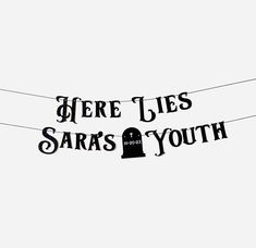 there lies sara's youth hanging on the clothes line with their name in black