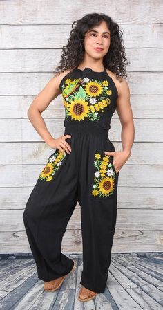 This Beautiful Capri Jumpsuit boasts a Traditional Mexican floral design combined with a modern style.  The embroidered bodice with lace details combined with the halter top makes it fun and flirty.  It's made out of fine Mexican cotton. All items are custom made to order. Our turn around time is about 5-10 business days.  This can change during peak season.  We want you to be happy doing business with us so any questions, any concerns are welcome.  We are fast to reply! Shipping:  *We take grea Embroidered Cotton Jumpsuits And Rompers For Spring, Casual Embroidered Jumpsuits And Rompers For Spring, Spring Embroidered Cotton Overalls, Spring Embroidered Fitted Jumpsuits And Rompers, Embroidered Fitted Jumpsuits And Rompers For Spring, Embroidered Fitted Sleeveless Jumpsuits And Rompers, Embroidered Cotton Jumpsuits And Rompers For Summer, Sleeveless Embroidered Jumpsuits And Rompers For Summer, Mexican Jumpsuit