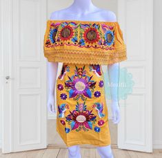 "Lace Trim Off the shoulder tie back Mexican dress with butterfly and sunflower embroidery. Made out of manta, 100% cotton. Color:Blue Small/Medium Bust- 42\" Hips- 44\" Waist- 44\" Length- 34\" Large Bust- 48\" Hips- 48\" Waist- 48\" Length- 38\" X-Large Bust- 52\" Hips- 52\" Waist- 52\" Length- 38\" 🧵Made in Chiapas, Mexico. 🧺Care Instructions: We recommend hand washing, lay flat to dry. 📲Please feel free to message me with any questions regarding sizing and fit. 📷Additional photos can be Yellow Bohemian Dress With Floral Embroidery, Summer Off-shoulder Dress With Floral Embroidery, Summer Floral Embroidered Off-shoulder Dress, Off-shoulder Floral Embroidered Summer Dress, Bohemian Embroidered Off-shoulder Summer Dress, Summer Off-shoulder Floral Embroidered Dress, Bohemian Off-shoulder Embroidered Summer Dress, Fitted Yellow Bohemian Embroidered Dress, Yellow Embroidered Dress For Summer