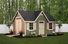 a small shed in the middle of a yard with flowers growing around it and trees