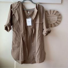 Boho Tunic. New With A Tag. Size M New To Poshmark? Sign Up With The Code Bstworld For $10 Off Your First Order Casual Beige Tops With Roll-up Sleeves, Spring Tops With Roll-up Sleeves For Everyday, Khaki Long Sleeve Top For Summer, Casual Brown Blouse With Relaxed Fit, Casual Khaki Tops For Beach, Cotton Shirt For Beach In Fall Season, Khaki Button-up Beach Top, Relaxed Fit Khaki Beach Shirt, Brown Shirts With Pockets For Spring