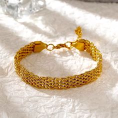 Highlights: Built To Withstand Everyday Wear, Hypoallergenic And Non-Tarnish Bracelet, Unisize, Waterproof Bracelet. This Elegant Everyday Mesh Bracelet Subtly Stands Out Drawing Beauty From Its Mere Simplicity. Crafted Out Of Rich 18k Yellow Gold On A Lightweight Non-Irritating Build To Ensure Your Everyday Bracelets Keep Up With Your Busy Everyday Lifestyle. Wear It As A Dainty Bracelet Whether You're Sporting It Out With Your Favorite Casual Tee And Jeans Or Layering It With Your Favorite Jew Everyday Bracelets, Waterproof Bracelet, Golden Bracelet, Everyday Bracelet, Bracelet Dainty, Dainty Bracelet, Gold Bracelet For Women, Gold Bracelets, Mesh Bracelet