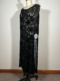 "Dream dress alert This 1920s silk burnout (technically voided) velvet dress features a beaded floral appliqué with tassels and a scoop neckline. The dress is sheer and could be worn with many different colored slips.  This dress had been repaired. The neckline and armscyes have been rehemmed and holes have been patched on the front left strap. A small patch was also added to the back neckline to reinforce a small split.  Measurements- meant to fit a bit loose! Bust- 42\" Waist- 39\" Length- 45\"" Burnout Velvet Dress, Burnout Velvet, Antique Fabrics, Floral Applique, Velvet Dress, Dress Clothes For Women, Dream Dress, Dress Fabric, Cashmere Sweaters