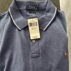 Never Worn Polo Blue Long Sleeve Cotton Polo Shirt, Blue Casual Polo Shirt, Blue Casual Collared Polo Shirt, Long Sleeve Blue Polo Shirt For Spring, Light Blue Casual Polo Shirt, Blue Long Sleeve Polo Shirt For Spring, Casual Light Blue Polo Shirt, Ralph Lauren Shirt, Mens Polo