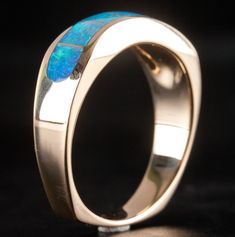 14k Yellow Gold AA Opal Inlay Wave Style Ring 7.2gMetal Information: 14k Yellow GoldTotal Weight: 7.2gBand Width: 3.3mmSize: 9.75Stone InformationMain StoneGem Type: OpalShape: InlayColor: MultiClarity/Quality: AANumber of Stones: 7Estimated Retail Price: $1610.00OUR PRICE: $1285.00SizingMany of our pieces can be re-sized at the buyers request. Please email us if you require our skilled professional services.45911 Modern 14k Gold Opal Ring, Modern 14k Gold Opal Ring With Polished Finish, Modern Opal Ring In 14k Gold With Polished Finish, Luxury Inlay Rings For Anniversary, 14k Gold Multi-stone Round Jewelry, 14k Gold Opal Ring With Polished Finish For Promise, Formal 14k Gold Opal Ring With Polished Finish, Formal 14k Gold Polished Opal Ring, Luxury 14k Gold Opal Ring For Anniversary