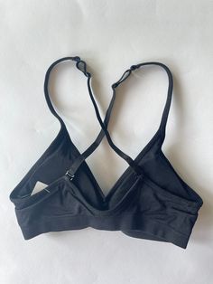 A-B cup V bra. Our convertible V Bras come in 2 cup sizes A/B & C/D The back straps can be criss crossed to accommodate racerback tops Crisscross Sports Bra With Built-in Bra, Workout Racerback Bra With Built-in Support, Solid Strappy Sports Bra, Black Triangle Top Sports Bra With Built-in Bra, Solid Color Strappy Sports Bra, Black Bra With Adjustable Straps And Medium Support, Strappy Stretch Bra With Built-in Support, Solid Color Strappy Sports Bra With Adjustable Straps, Crisscross Stretch Sports Bra With Straps