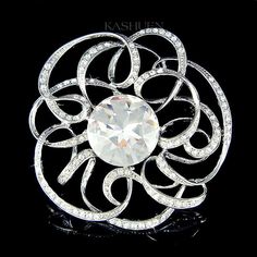 "PERFECT GIFT /WEDDING GIFT FOR BRIDE / BRIDESMAID / LADY! This brand new, stunning curved cut out Flower brooch is covered with SWAROVSKI crystals. Super sparkling! This sparkling pin measures 3\" wide X 3\" high (76mm X 76m). Crystal Colors (Standard Swarovski Color Names): Crystal Clear Great piece for your collection! Prices are in US$. For shipping policies and other important information, click on \"profile\" on the right. See an item that you like but has already been sold? Contact me to Elegant Diamond White Brooches For Wedding, Elegant Diamond White Wedding Brooches, White Crystal Brooch For Anniversary, White Crystal Brooches For Wedding, Crystal Flower Brooch For Weddings, White Crystal Wedding Brooches, White Crystal Brooch For Formal Occasions, Elegant Crystal Wedding Brooches, Elegant Wedding Crystal Brooches