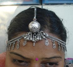 vintage antique collectible tribal old silver tika head ornament hair jewellery from rajasthan india. great handmade design, good for jewellery collection. Note - please check pictures care fully for more detail. center piece is filled with wax. weight - 62 grams Material - silver & original old worn piece. Silver Temple Jewelry Tikka For Ceremonial Use, Silver Tilla Tikka For Navratri, Silver Tikka With Tilla For Navratri, Traditional Silver Tikka With Latkans, Silver Bohemian Headband, Traditional Silver Tikka For Festivals, Traditional Silver Tikka With Tilla Detail, Traditional Silver Tikka With Intricate Design, Silver Ceremonial Tikka With Intricate Design